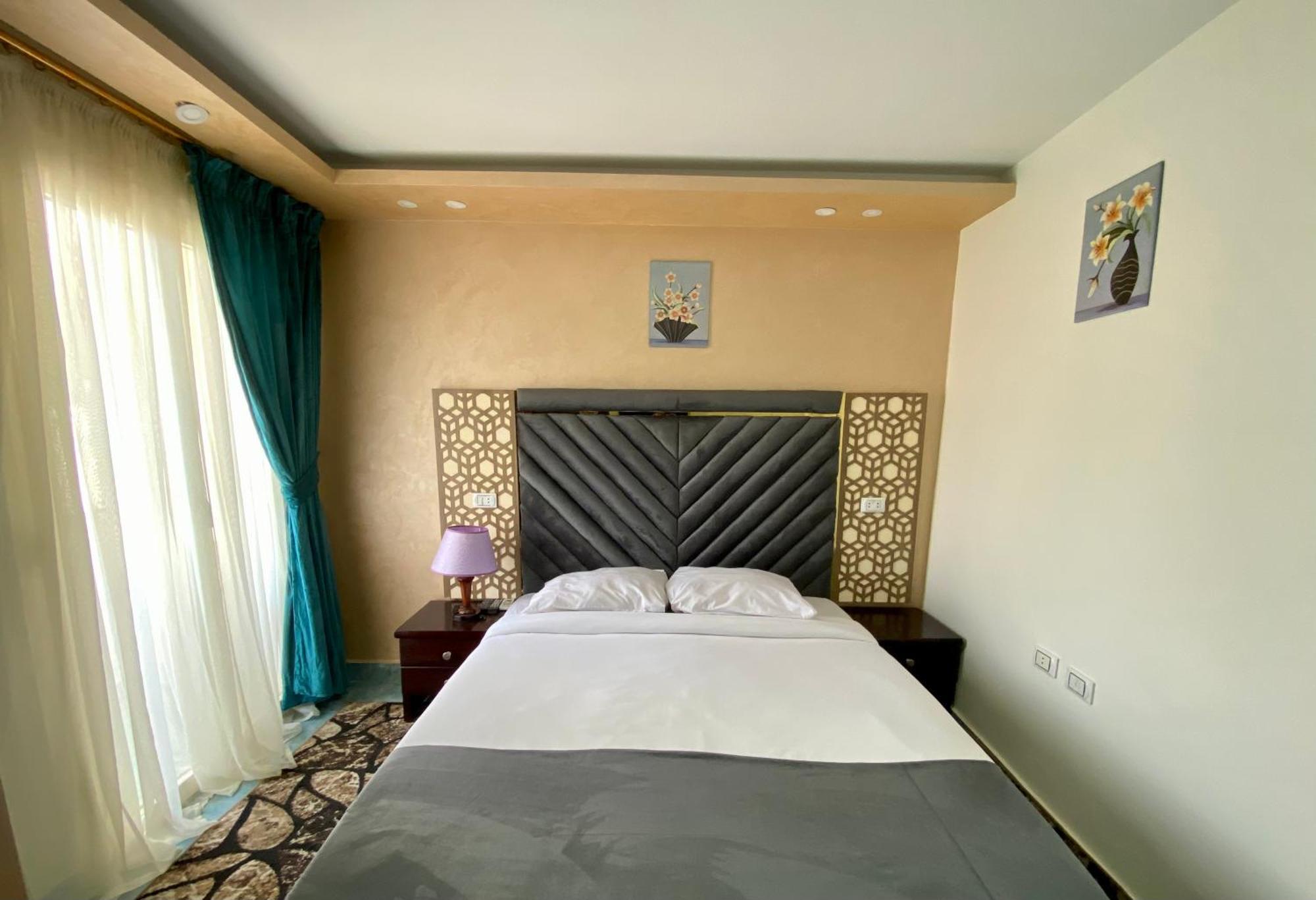 Golden Pyramids Inn Kafret el-Gabal Екстериор снимка