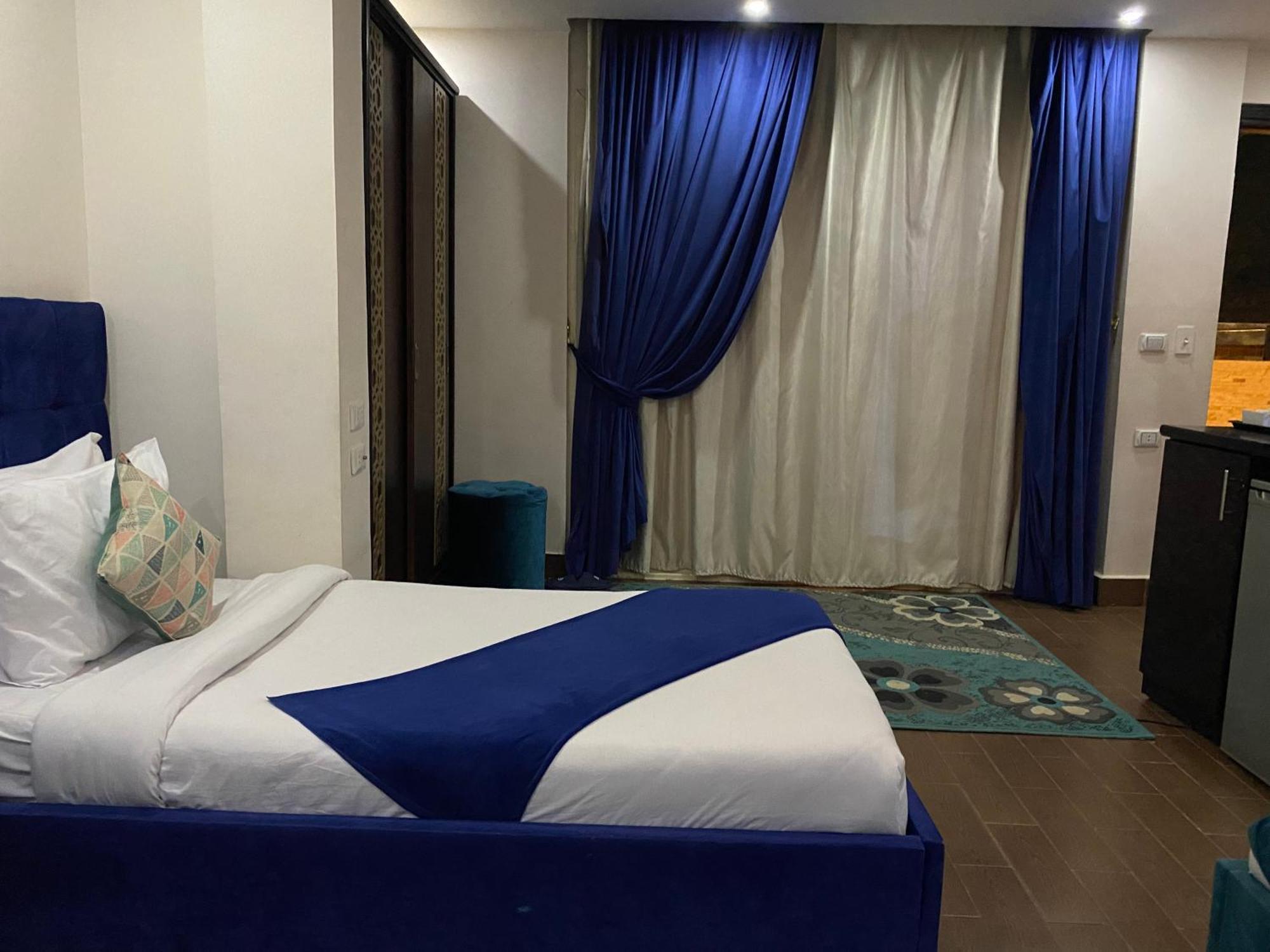 Golden Pyramids Inn Kafret el-Gabal Екстериор снимка