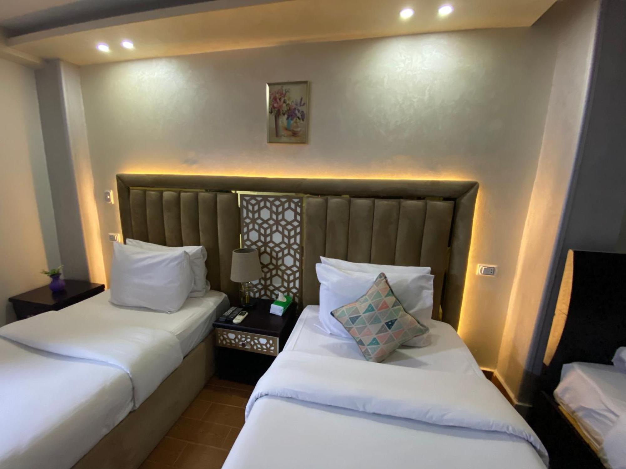 Golden Pyramids Inn Kafret el-Gabal Екстериор снимка